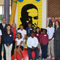 <p>Students greet John Marshall at the Thurgood Marshall Middle School at Six to Six Interdistrict Magnet School in Bridgeport. See story for names.</p>