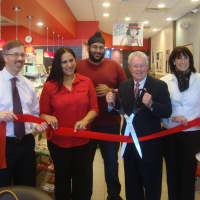 <p>Red Mango celebrates opening in Fairfield with a ribbon cutting with town officials and members of the Chamber of Commerce.</p>