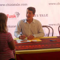 <p>Greenwich teen Jack Jones and Zimbabwe illustrator Jacqui Taylor sign copies of &quot;Chizi&#x27;s Tale&quot; for young fans.</p>