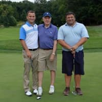 <p>(From left to right): Boys &amp; Girls Club of Northern Westchester golf tournament committee member Rick Suarez with fellow golfers Stephen Long and Ron Koff of the Clarfeld Wealth Strategists &amp; Financial Confidantes team ready to putt on the green.</p>