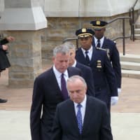 <p>New York City Mayor Bill de Blasio and Police Commissioner William Bratton exit the church where Michael Williams&#x27; funeral took place.</p>