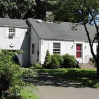<p>The house at 6 Moore St. in Darien is open for viewing on Sunday.</p>