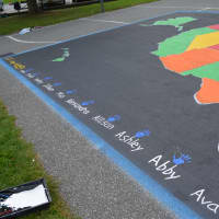 <p>The new mural at North Salem&#x27;s Pequenakonck Elementary School includes names and handprints from the Girl Scouts who were involved.</p>