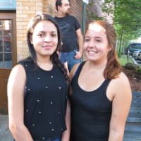 <p>Arianna Zepeda, left, and Evelyn Valero, freshmen at Sleepy Hollow High, soaked up the village drama on Friday.</p>