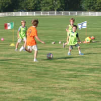 <p>Children play soccer at Go Wild!</p>
