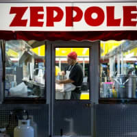 <p>Zeppoles, cold drinks and food were offered. </p>