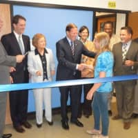 <p>U.S. Sen. Richard Blumenthal of Greenwich welcomes Cloonan Middle School President Maura Johnstone prior to the ribbon cutting of the Family Centers new clinic in the school.</p>