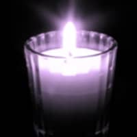 <p>Remember the victims of domestic violence at a candlelight vigil in October. </p>