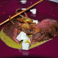 <p>A grilled skirt steak was prepared for the evening. </p>
