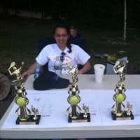 <p>Slammer Tennis World workers get ready to distribute the trophies.</p>