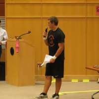 <p>MHS student Andrew Sommers spoke in length in Chinese as he led the welcoming ceremonies.</p>