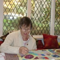 <p>Sonhild Rodney works on a quilt at the Stamford Museum &amp; Nature Center. The quilt will be used in a fundraiser for the museum.</p>