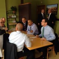 <p>Gov. Dannel Malloy, far right, eats lunch with President Barack Obama before a rally on minimum wage in March in New Britain. </p>