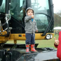 <p>A young man enjoys the up-close experience on a piece of construction equipment at KIDZFEST, a fundraiser by the Human Services Council of Norwalk to support Children&#x27;s Connection.</p>