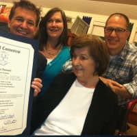 <p>Longtime Springdale advocate Marilyn Trefry looks at the citation given to her. Looking on from left are her children: Paul, Lynda Gutierrez and Jim. She was honored at Ferguson Library&#x27;s Weed Memorial &amp; Hollander Branch </p>
