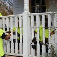 <p>Students help fix a porch at the reservation.</p>