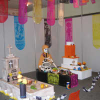 <p>The El Día de los Muertos (Day of the Dead) exhibit will feature  sugar skulls and paper cut-outs plus photographs and possessions of dead loved ones. </p>