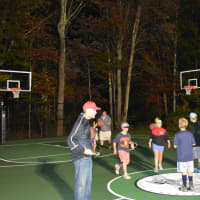 <p>Following the ribbon cutting at Bedford Village Memorial Park, kids took to the new court to play.</p>