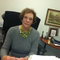 <p>Janet Lindstrom, executive director of the New Canaan Historical Society, in an office at one of the society&#x27;s buildings, the Town House. The society is celebrating its 125th anniversary with a series of events this weekend.</p>