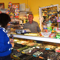 <p>A customer surveys the goods at Lil&#x27; Chocolate Shoppe. </p>