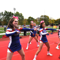 <p>Carmel&#x27;s cheerleader strut their stuff in front of the hometown fans.</p>