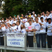 <p>&#x27;Pac students cheer on the Indians in a 27-7 win at Carmel on Saturday.</p>