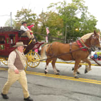 <p>A horse-drawn wagon showcased by Wells Fargo Bank.</p>