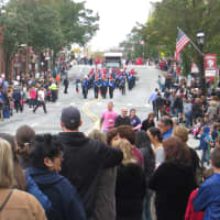 <p>Parade goers looking down Halstead Avenue from the corner of Harrison Avenue.</p>