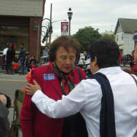 <p>Congresswoman Nita Lowey, left, talks to a constituent Monday during Harrison&#x27;s annual Columbus Day Parade.</p>
