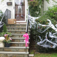 <p>A Rye homeowner at 115 Coolidge Ave. used cobwebs and skeletons to decorate the front yard.</p>