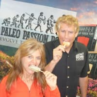 <p>Kim and Marty Sands take a bite out of their Paleo Passion Pops, an all-natural frozen dessert. The Greenwich-based company is selling the popsicles in Fairfield and Westchester counties and Manhattan.</p>