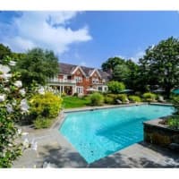 <p>This house at 11 Upland Lane in Armonk is open for viewing on Saturday.</p>