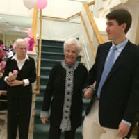 <p>Darien High School students joined residents of Atria Darien Assisted Living at the Pretty in Pink fashion show on Oct. 14.</p>