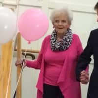 <p>Atria Darien Assisted Living residents were escorted at the Pretty in Pink fashion show by Darien High School students. </p>