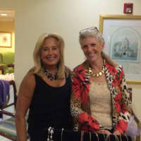 <p>Helen Ainson Darien owner Erica Jensen meets Mallie Massarro.</p>