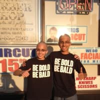 <p>Two eighth-grade boys Alexander Dias and his best friend Conlin Brown shave their heads in memory of Jeffrey Clark, who passed away from cancer.</p>