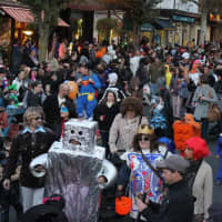 <p>Patrons marched in costume and enjoyed the parade&#x27;s festivities. </p>
