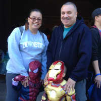 <p>The Edwards family: Parents Angel and Gregory with Brandon as Spiderman and Alexander as Iron Man</p>
