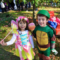 <p>Young children dressed in all kinds of costumes. </p>