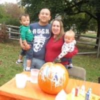 <p>The Mui family enjoyed its morning at Hilltop Hanover Farm. Pictured are birthday boy Liam (3 on Oct. 18), his parents Michael and Stephanie, and his younger brother Colin. Liam selected his own pumpkin and then painted it.</p>