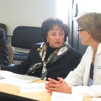 <p>U.S. Rep. Nita Lowey of Harrison, center, speaks with Dr. Renee Garrick, right, executive medical director of the Westchester Medical Center.</p>