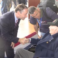 <p>Westchester County Executive Rob Astorino greets a World War veteran on Saturday.
</p>