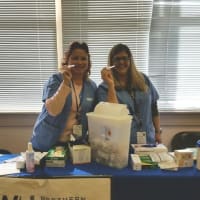 <p>Nurses administered flu shots to members of the community.</p>