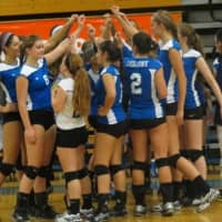 <p>The Fairfield Ludlowe volleyball team gets together before a game.</p>