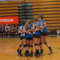 <p>Ludlowe players huddle up during a recent game.</p>