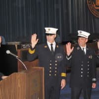 <p>New Rochelle Deputy Mayor Barry Fertel reads the oath of office for promoted and probationary members.
</p>