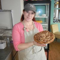 <p>Leisha Young, owner of Bridgeport&#x27;s Leisha&#x27;s Bakeria, with her Dutch apple pie.</p>