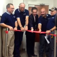 <p>Elmsford department heads cut a ribbon at the EOC&#x27;s re-dedication ceremony</p>