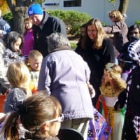 <p>Kids go trick or treating on the green in Wilton.</p>