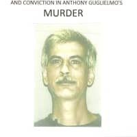 <p>A reward poster in the former &quot;cold case,&#x27;&#x27; following the stabbing death of Anthony Guglielmo.</p>